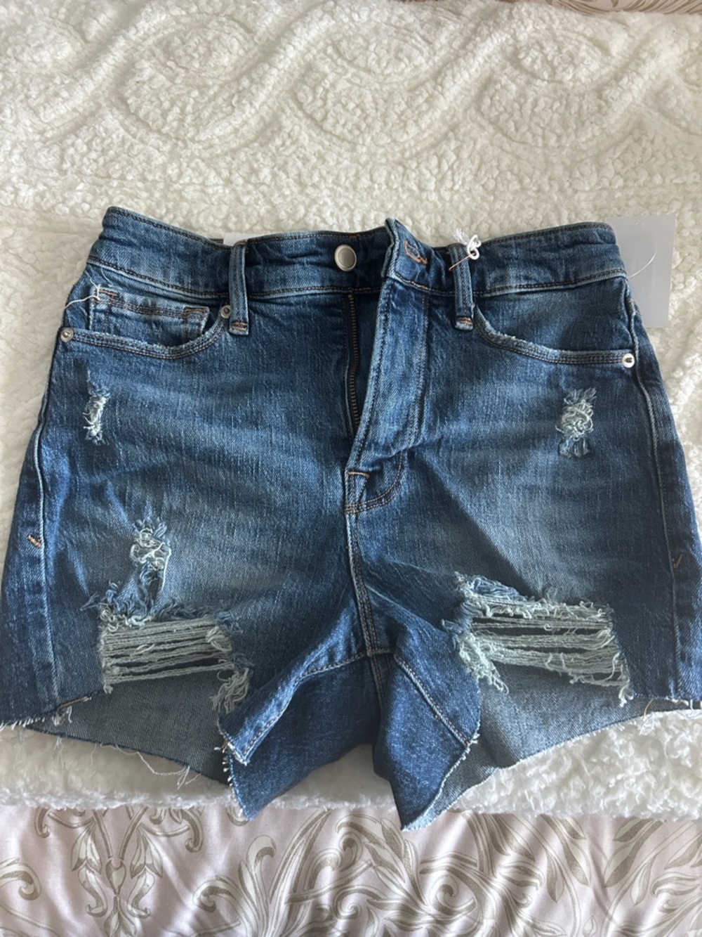 Good American Distressed Blue Denim Cutoff Shorts